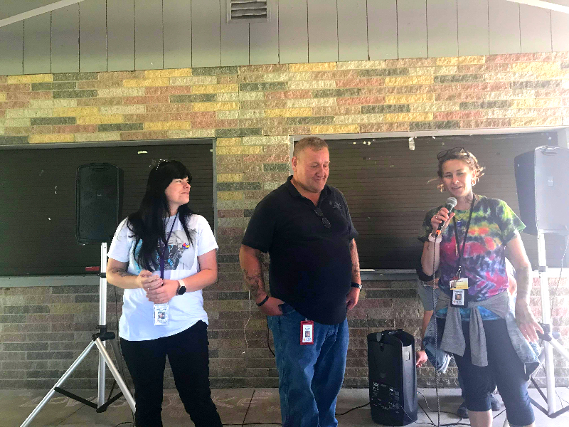 Mental Health Association Peer Specialist Morgan Rowley (left), North County Recovery Center Manager Ken Kendall, and Strong Starts Navigator Roseann Crocker welcomed a large crowd to the recent Participant Celebration in Dunkirk’s Point Gratiot Park.