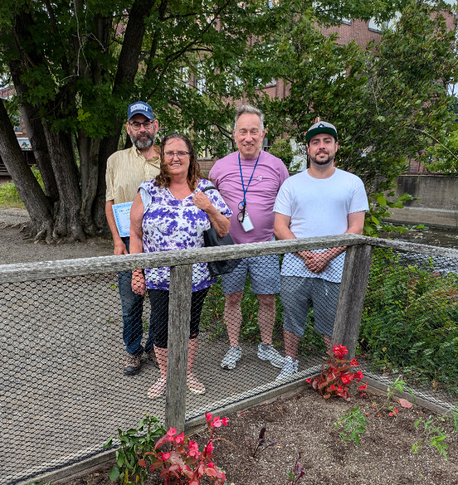 Three participants were recognized at the July recovery luncheon for their work on the flower garden behind the Mental Health Association’s facility along the Chadakoin River. Pictured from left are Rod Dorchak, Diana Bloom, Executive Director Steven Cobb, and Pete Carcione.